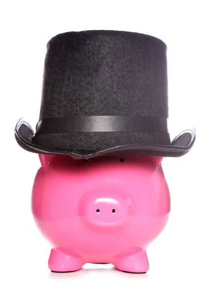 Banco porquinho usando chapéu superior — Fotografia de Stock