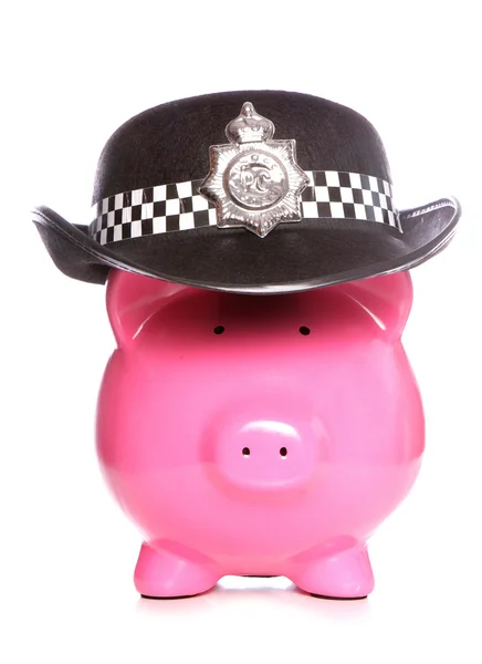 Piggy bank sobie kapelusz policji — Zdjęcie stockowe