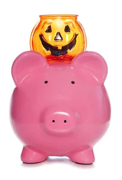 Halloween pompoen kruik en piggy bank — Stockfoto