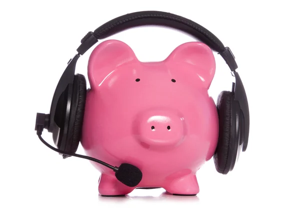 Sparschwein mit Bluetooth-Headset — Stockfoto