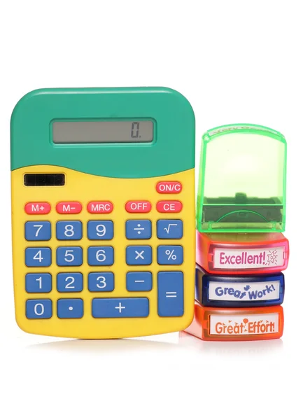 School marking stamps and calculator — Stock Photo, Image