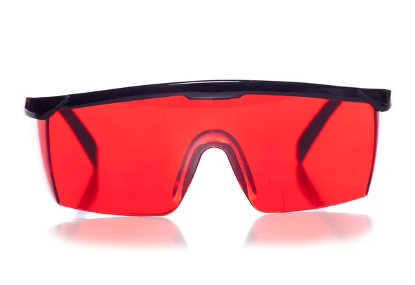 Red protective safety glasses — Stock Photo, Image