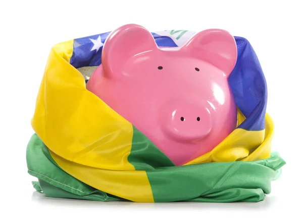 Sparschwein mit brasilianischer Flagge — Stockfoto