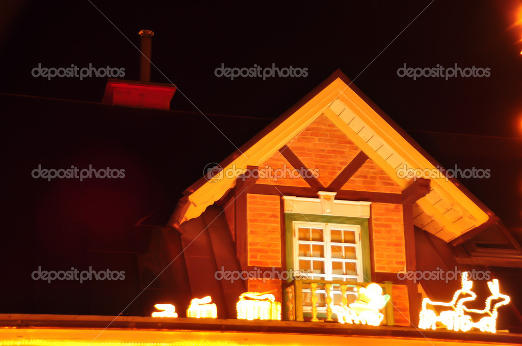 Christmas decorations on the roof of the house– stock image
