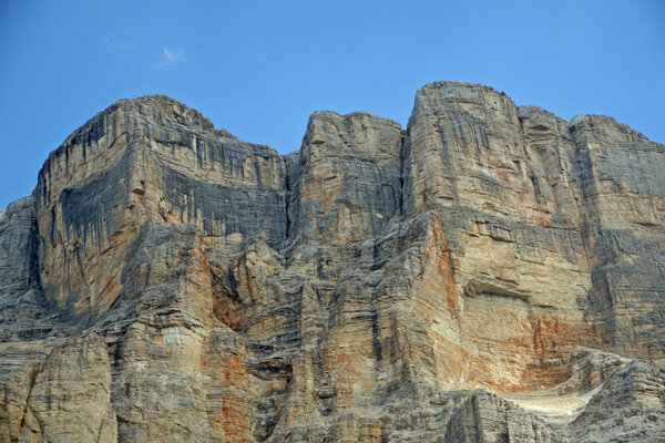 Rocky wall with orange nuances of the Dolomites