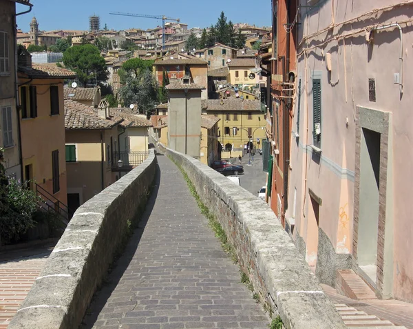 Ancient Roman aqueduct became a sidewalk in the town of Perugia — Stock Photo, Image