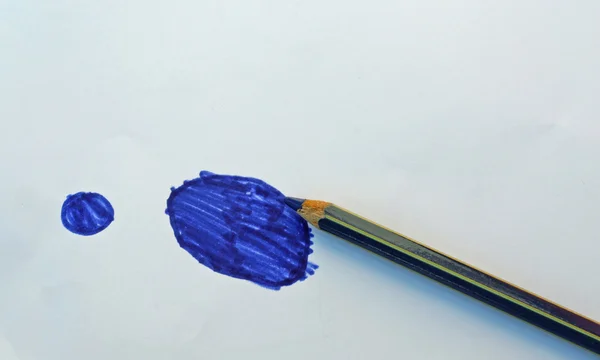 Blue pencil with a patch of blue on the white sheet 2 — Stock Photo, Image