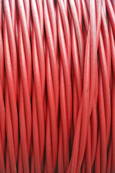 Textures rolled electricity cables around a large spool — Stock Photo, Image