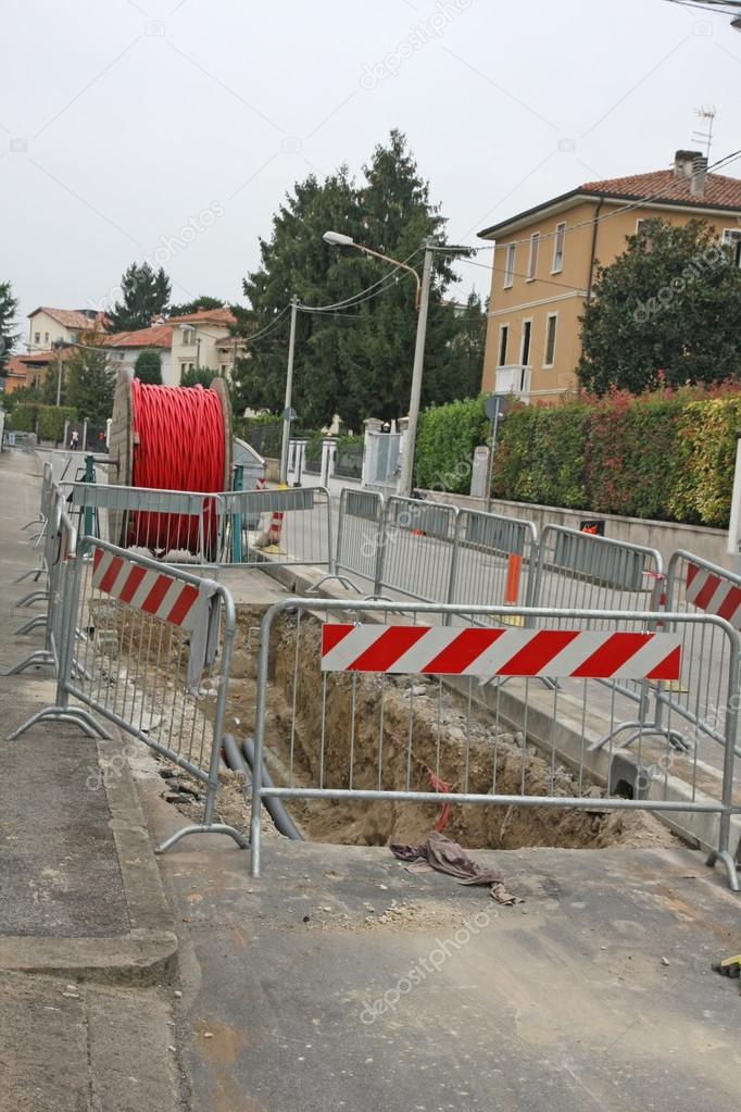 Roadworks with a excavation for the laying of high voltage power
