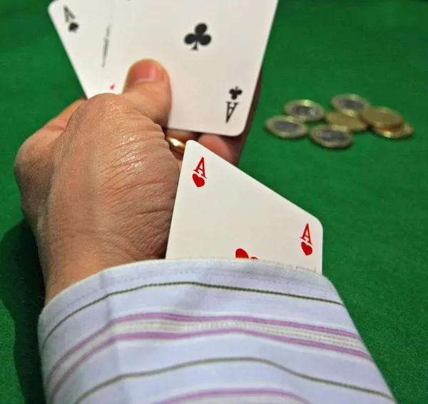 Cheat with the ace of hearts in the hole at the casino — Stock Photo, Image