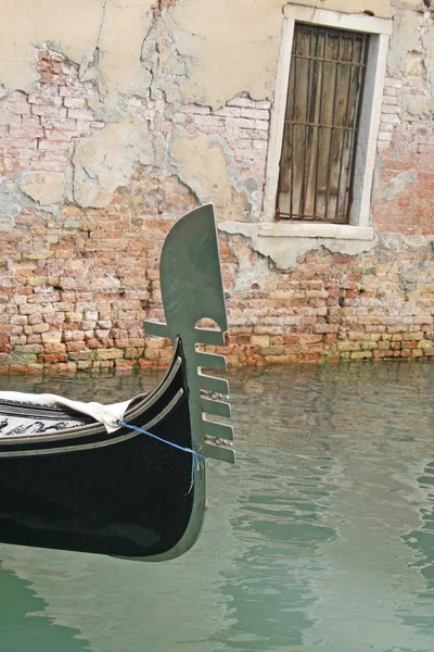 Top of the gondola in a canal in venice water — Stock Photo, Image