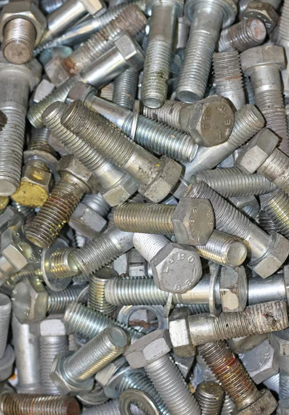 Pile of bolts of different sizes and many different sizes — Stock Photo, Image