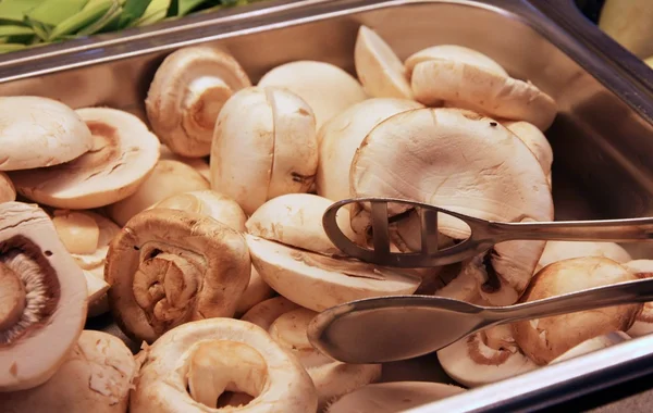 Champignons mushrooms and mushrooms in the tray at the restauran — Stock Photo, Image