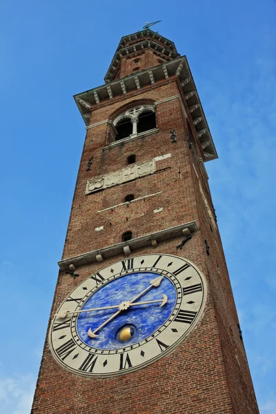 High tower with clock in red brick Basilica Palladiana in vicenz Stock Picture