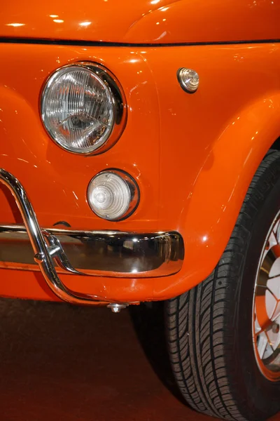 Headlight and tyre of a famous Italian machine — Stock Photo, Image