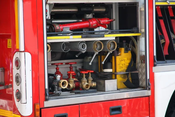 Rescue equipment and shutting down the fire inside fire truck — Stock Photo, Image