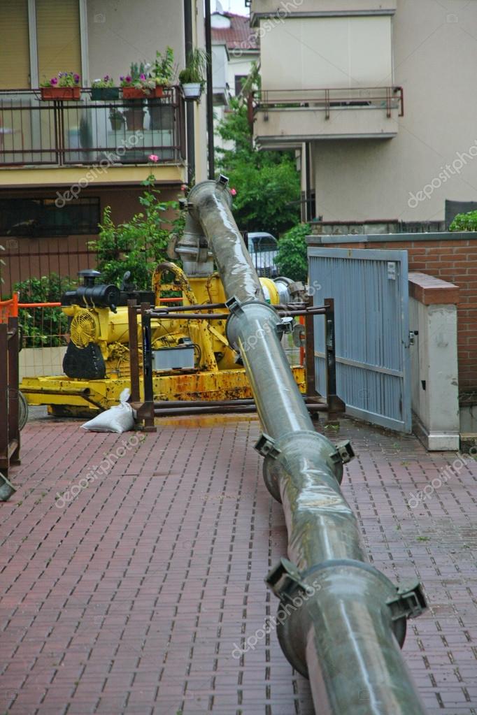 Impressive exhaust pipe connected to the motorpump to pump the — Stock