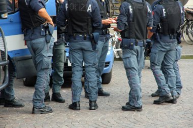 Italian policemen with bulletproof and armored jacket during a r clipart