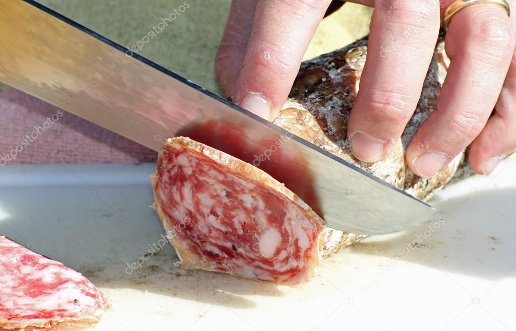 butcher cut the salami