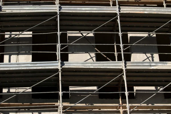 Steiger opbouwen voor de bouw van gebouwen — Stockfoto