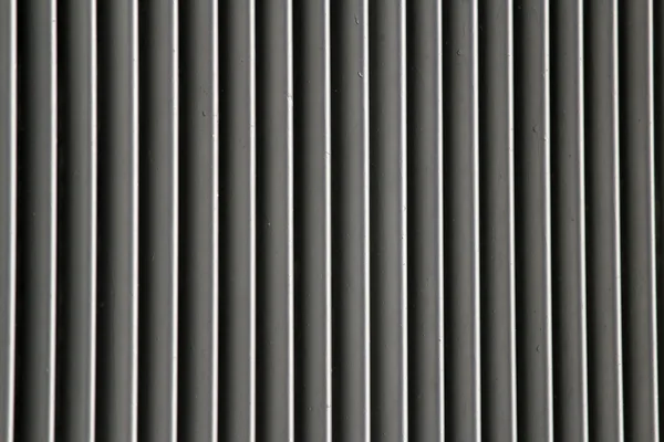 Gitter eines Heizkörpers und Heizkörperfarbe grau industriell — Stockfoto