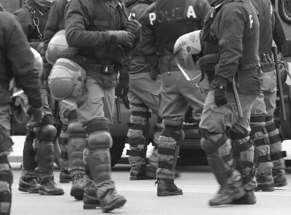 Policemen in war planning during a control of supporters — Stock Photo, Image