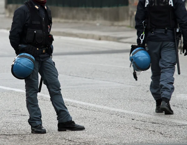 Policemen on patrol in the road to block the car — Stock Photo, Image