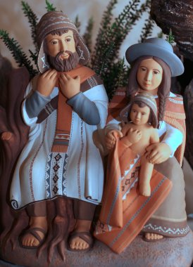 the Holy family with clothes Bolivians with cloak 1 clipart