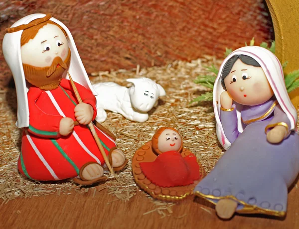 Jesus, Joseph and Mary in a manger — Stock Photo, Image