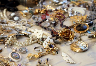 vintage necklaces and jewelry for sale in the antique shop clipart