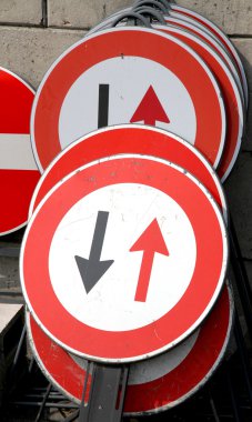 road signs with black arrows and the Red arrows clipart