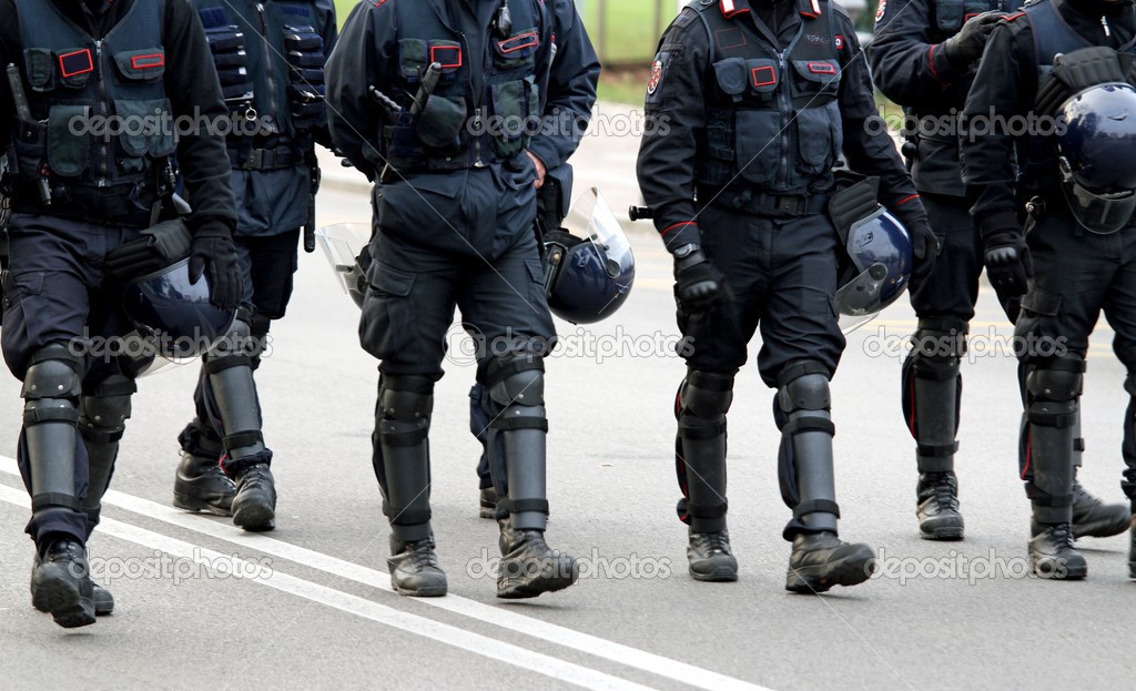 policemen and carabinieri marching