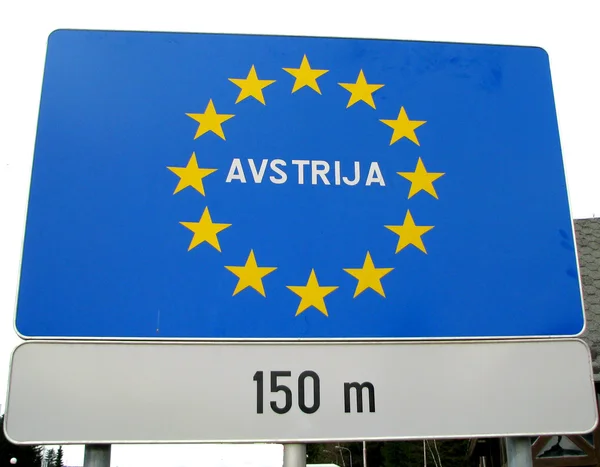 blue sign with yellow stars of European border Austrija 1