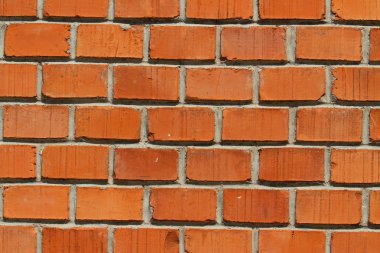 bir duvar bir evin Brick kırmızı bir arka plan