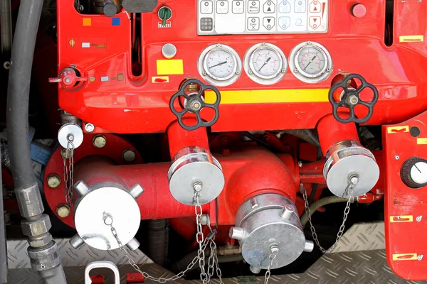 Taps and valves of trucks of firefighters with measuring gauges — Stock Photo, Image