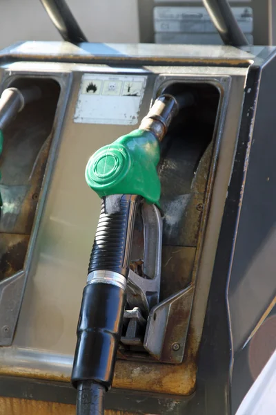 Gas pump into a distributor of automotive fuel — Stock Photo, Image