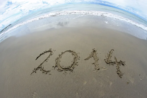 2014 år skrivit på sea beach 2 — Stockfoto