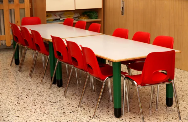 Chairs and tables inside a nursery Stock Photo