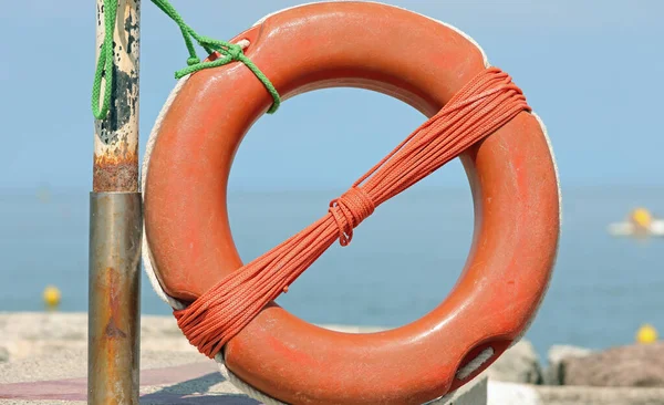 Large Orange Lifebuoy Available Swimmers Ocean Shore — Stock Photo, Image