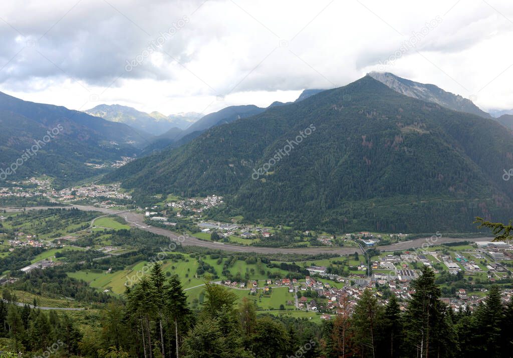 panorama of the valley of the Friuli Region in Northern Italy towards the Austrian border with cloudy sky