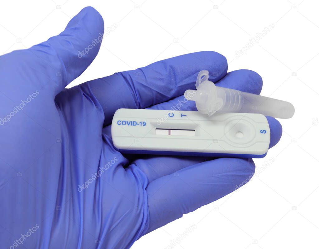 hand with latex glove holding test tube and medical device for covid-19 test with negative result and control line on white background
