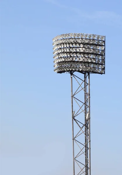 Light Tower Many Luminous Projectors Illuminate Night Sports Event Stadium — стоковое фото