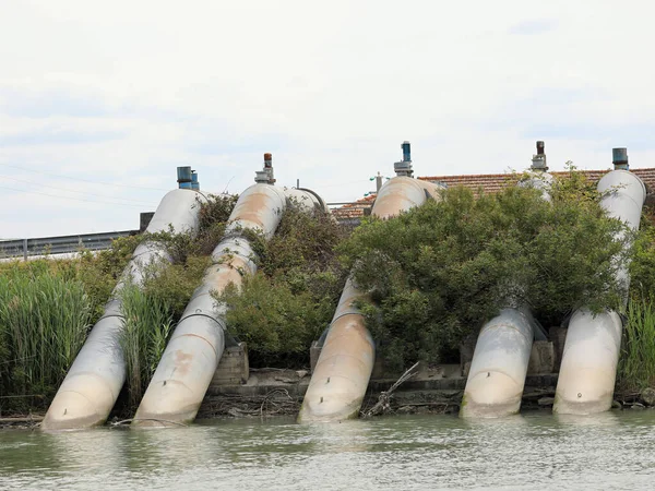 Large Pipes Powerful Dewatering Pump Suction Water Reclamation Marsh Area — стоковое фото