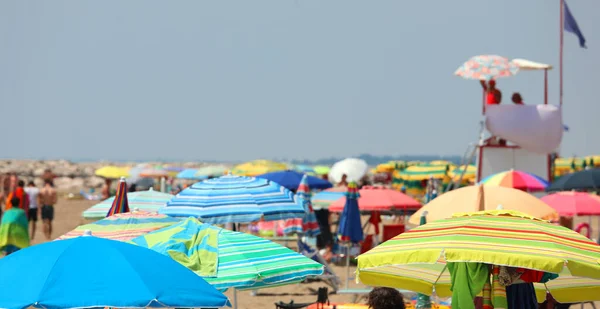 Many Colorful Umbrellas Crowded Beach Sea Coast Summer Lifeguard Watchtower —  Fotos de Stock