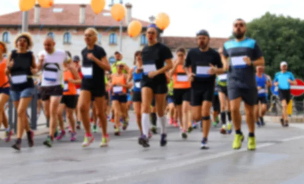 Intentionally Blurred Group Athletes Runners Foot Race City Asphalt Road — Fotografia de Stock
