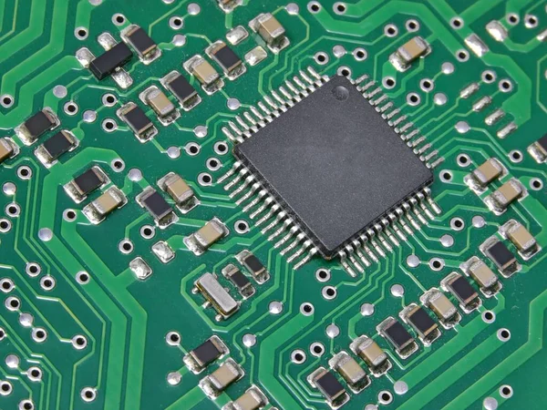 Microchip Many Devices Green Electronic Board — стоковое фото