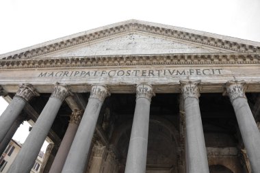 Ancient Temple Pantheon with latin roman text  that means Marco Agrippa son of Lucio consul for the third time built in Rome Italy