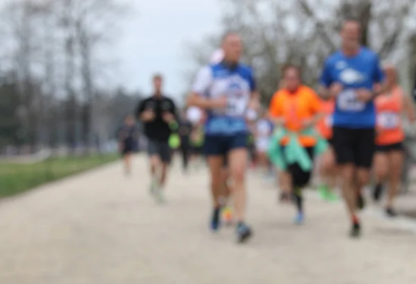Intentionally Blurred Group Athletes Running Public Park Ideal Sportswear Sporty — Foto de Stock