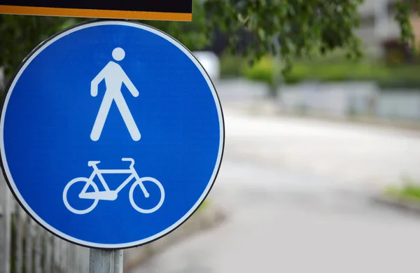 Blue Road Sign Two White Symbols Means Pedestrian Zone Cycle — Stockfoto