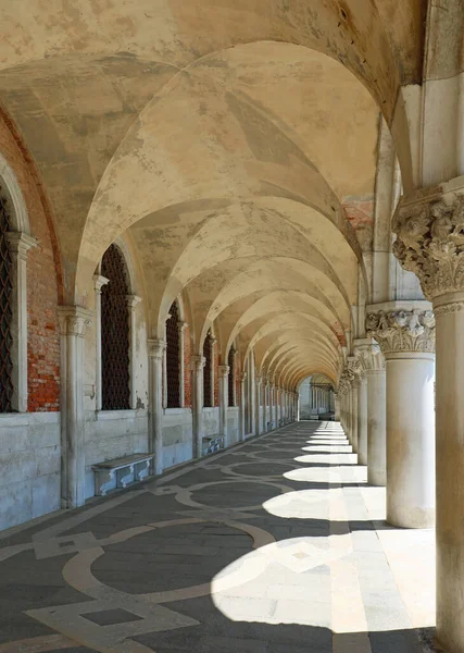 Venice, VE, Italy - May 26, 2020: Arcade of Ducal Palace called PALAZZO DUCALE in Italian language without people during lockdown